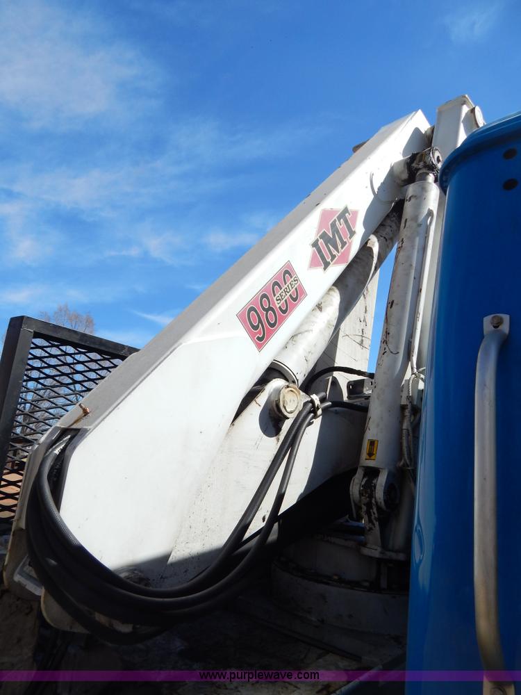 image for item I1134 1996 International 4900 flatbed truck with crane