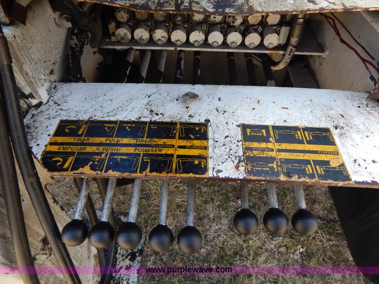 image for item I1134 1996 International 4900 flatbed truck with crane