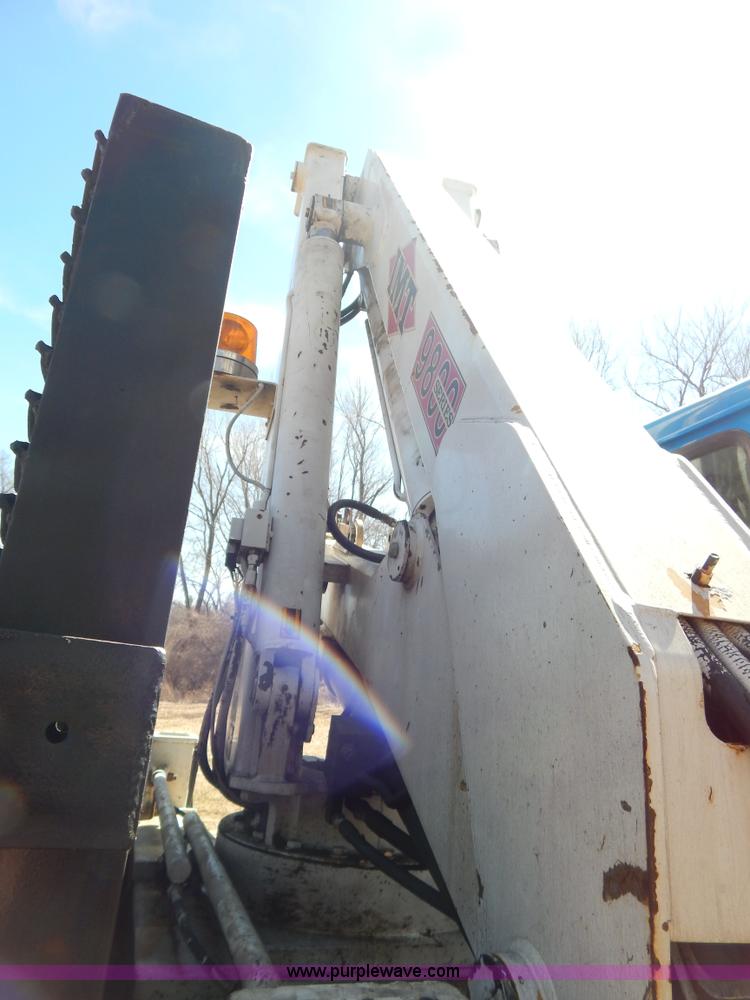 image for item I1134 1996 International 4900 flatbed truck with crane