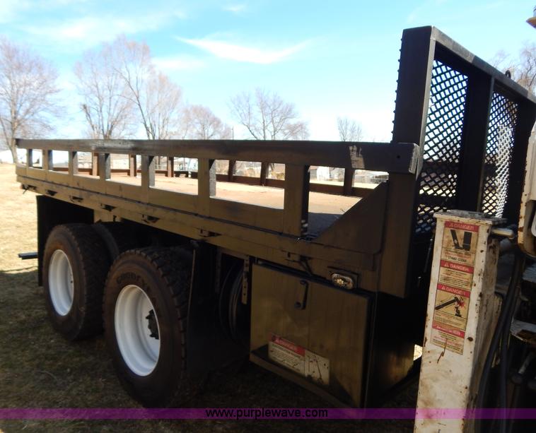 image for item I1134 1996 International 4900 flatbed truck with crane