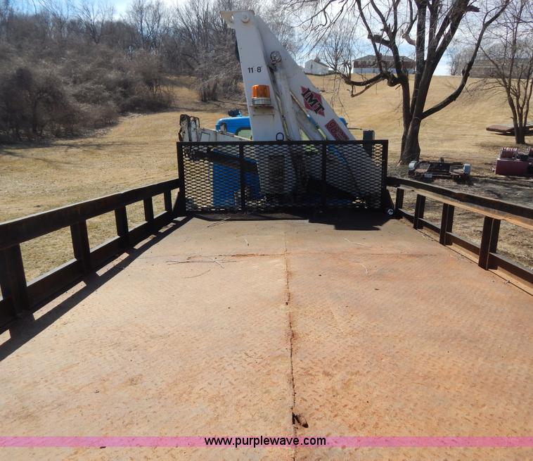image for item I1134 1996 International 4900 flatbed truck with crane