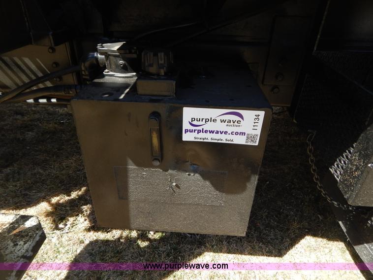 image for item I1134 1996 International 4900 flatbed truck with crane