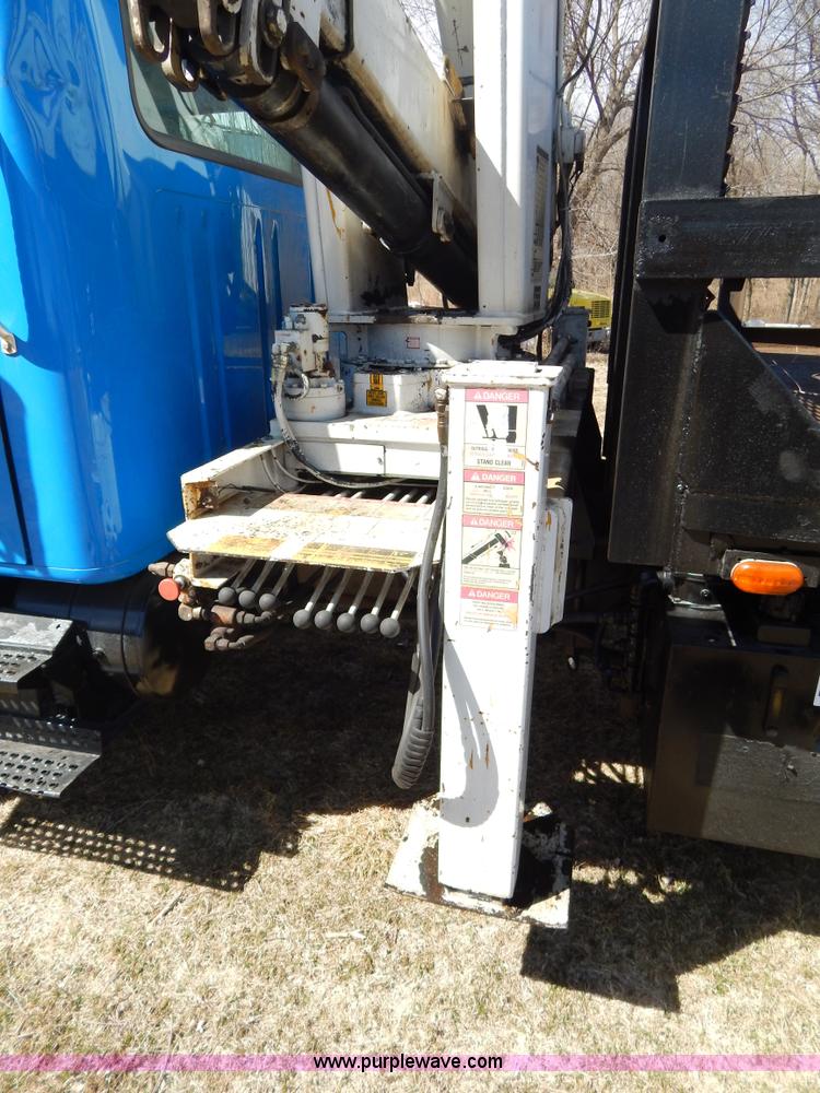 image for item I1134 1996 International 4900 flatbed truck with crane