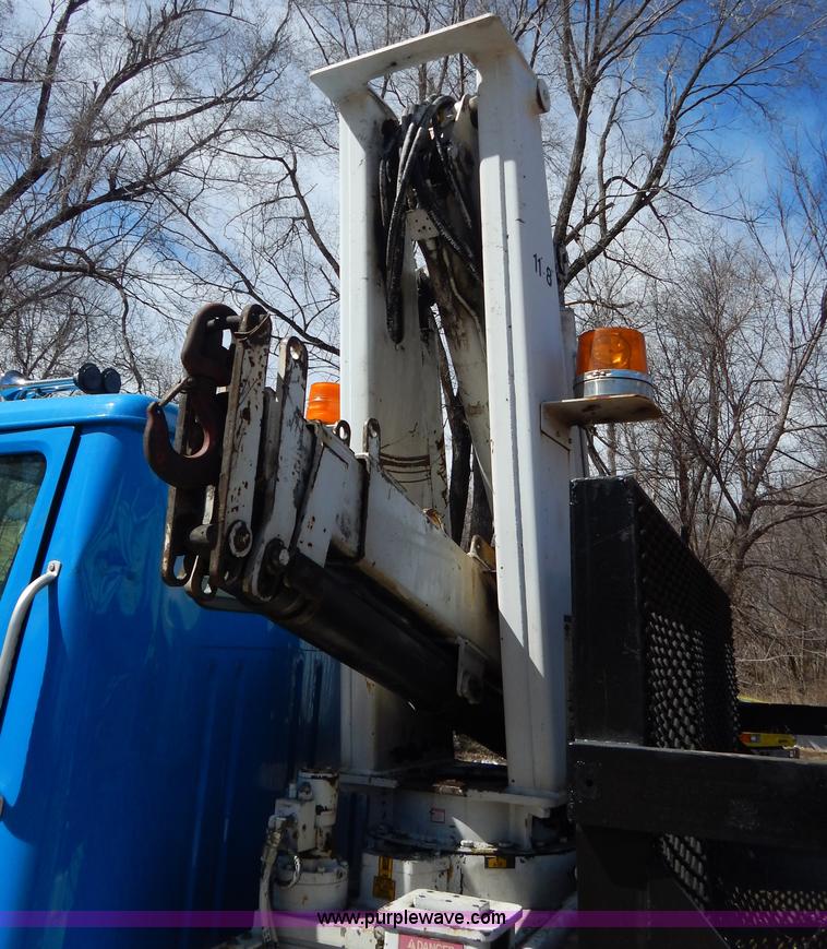 image for item I1134 1996 International 4900 flatbed truck with crane