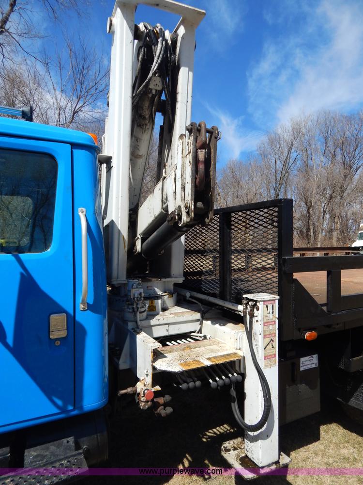 image for item I1134 1996 International 4900 flatbed truck with crane