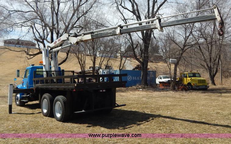 image for item I1134 1996 International 4900 flatbed truck with crane