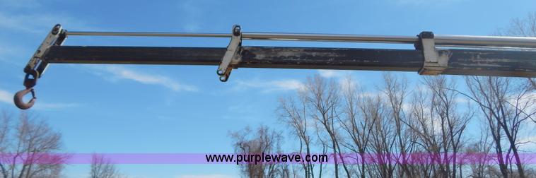 image for item I1134 1996 International 4900 flatbed truck with crane