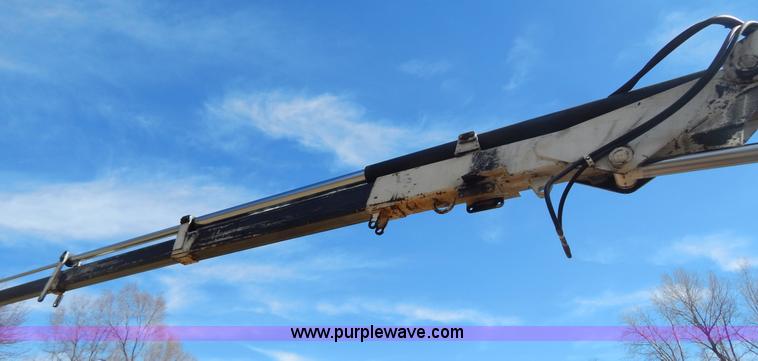 image for item I1134 1996 International 4900 flatbed truck with crane