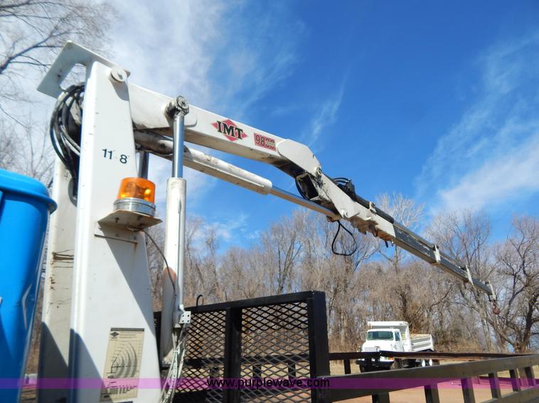 image for item I1134 1996 International 4900 flatbed truck with crane