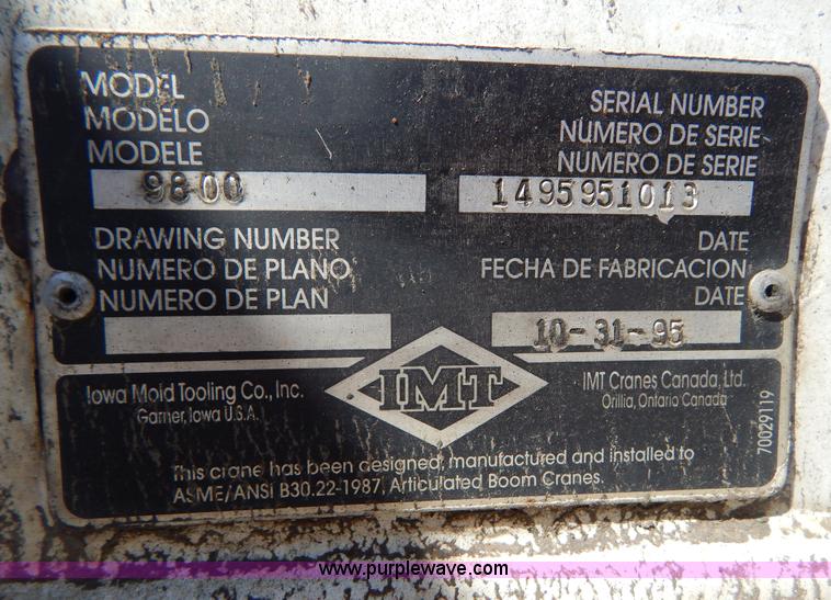 image for item I1134 1996 International 4900 flatbed truck with crane