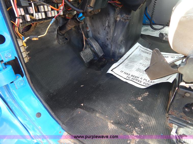 image for item I1134 1996 International 4900 flatbed truck with crane