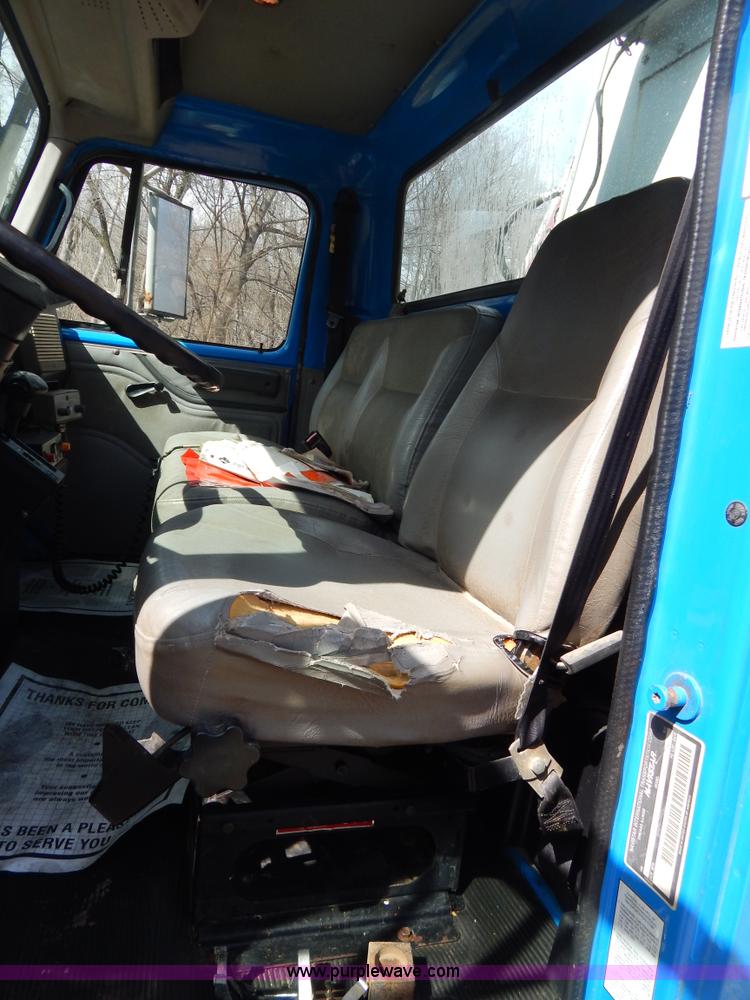 image for item I1134 1996 International 4900 flatbed truck with crane