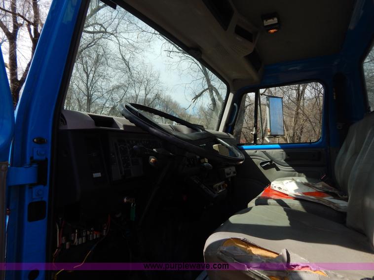 image for item I1134 1996 International 4900 flatbed truck with crane