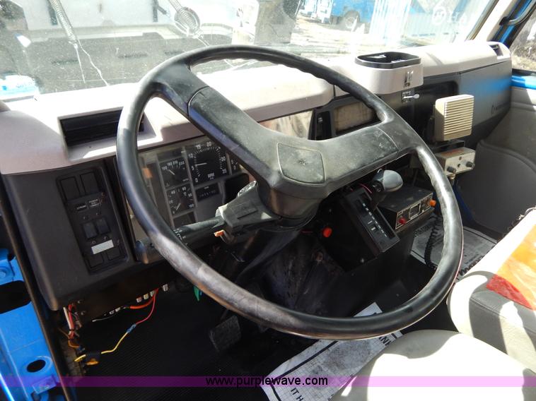 image for item I1134 1996 International 4900 flatbed truck with crane