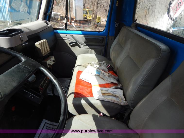 image for item I1134 1996 International 4900 flatbed truck with crane