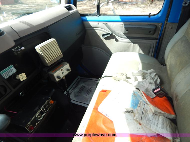 image for item I1134 1996 International 4900 flatbed truck with crane