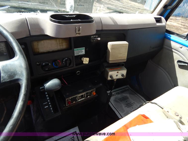 image for item I1134 1996 International 4900 flatbed truck with crane