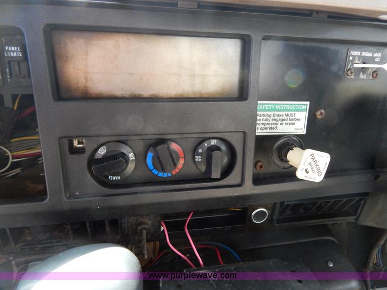 image for item I1134 1996 International 4900 flatbed truck with crane