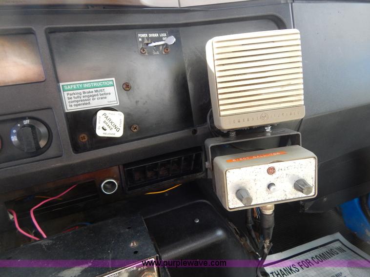 image for item I1134 1996 International 4900 flatbed truck with crane