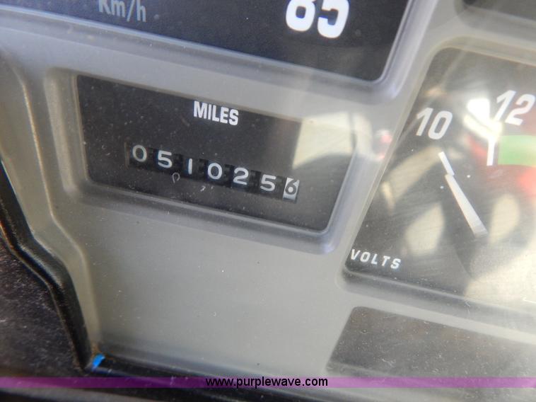 image for item I1134 1996 International 4900 flatbed truck with crane