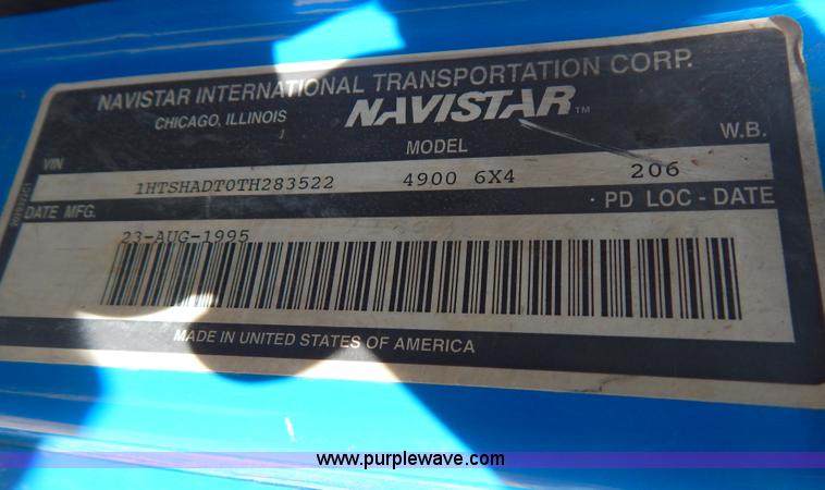 image for item I1134 1996 International 4900 flatbed truck with crane