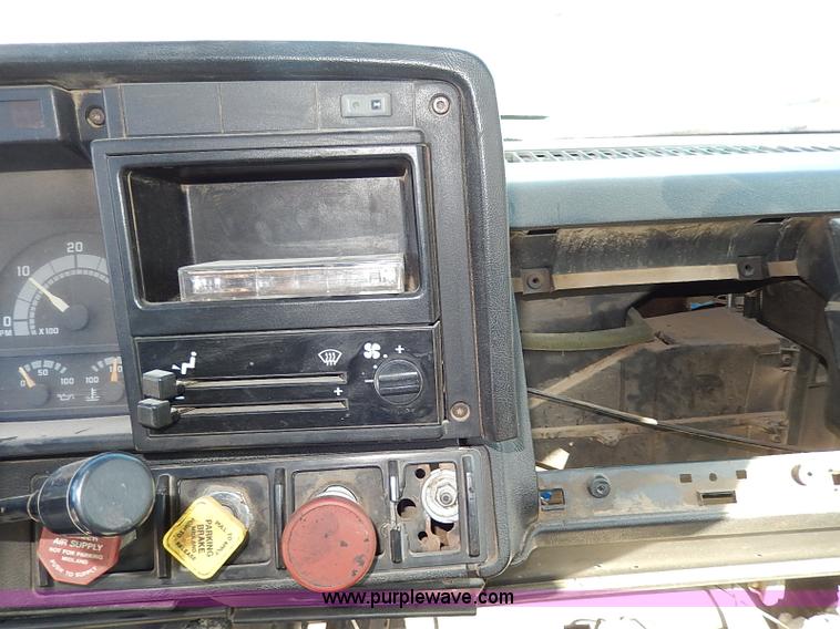 image for item I3748 1990 GMC TopKick tar applicator truck