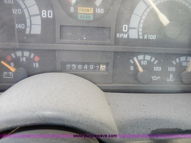 image for item I3748 1990 GMC TopKick tar applicator truck