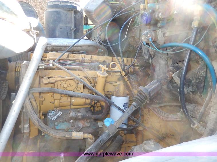 image for item I3748 1990 GMC TopKick tar applicator truck