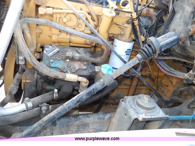 image for item I3748 1990 GMC TopKick tar applicator truck