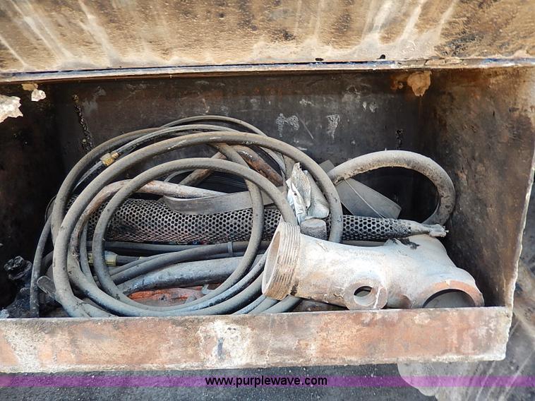 image for item I3748 1990 GMC TopKick tar applicator truck