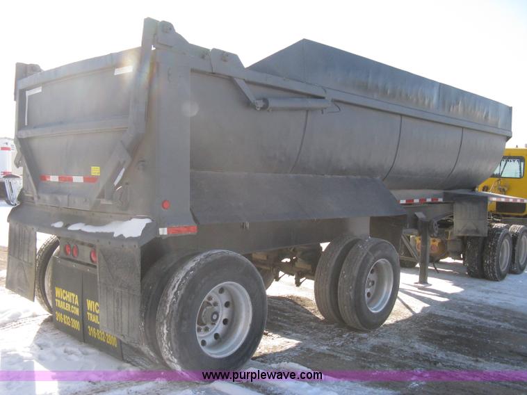 image for item I5626 1999 Stec barrel dump trailer