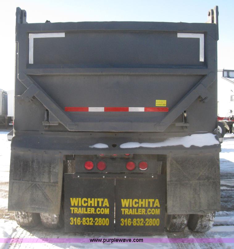 image for item I5626 1999 Stec barrel dump trailer