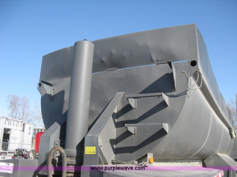image for item I5626 1999 Stec barrel dump trailer