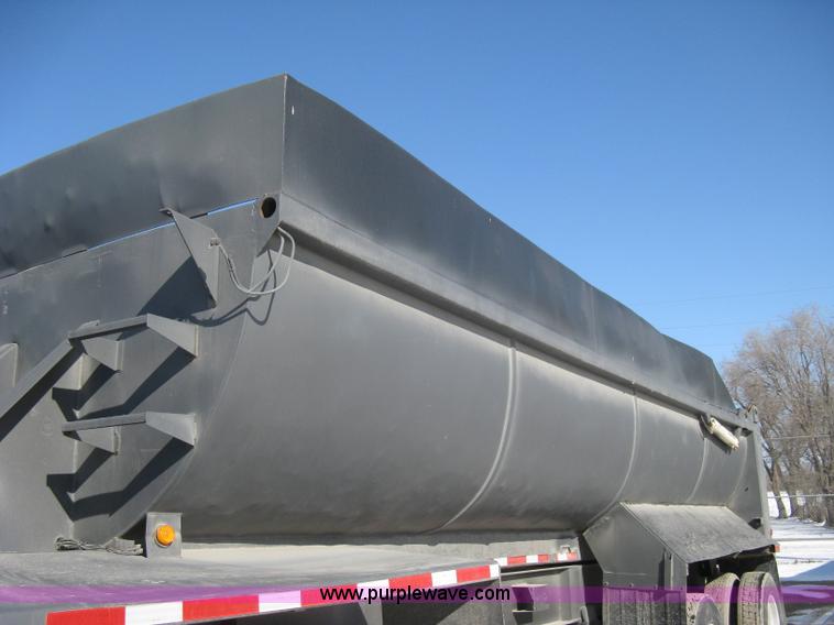 image for item I5626 1999 Stec barrel dump trailer