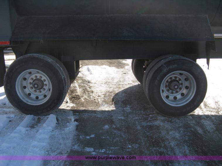 image for item I5626 1999 Stec barrel dump trailer
