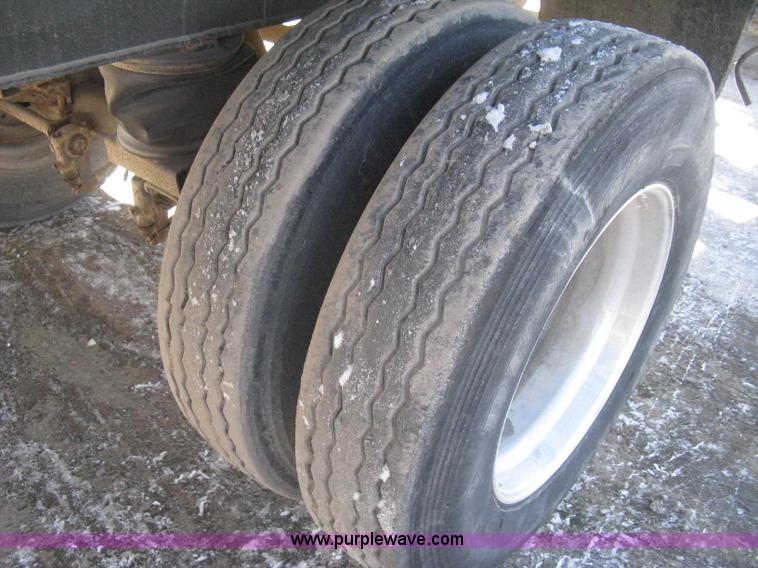 image for item I5626 1999 Stec barrel dump trailer