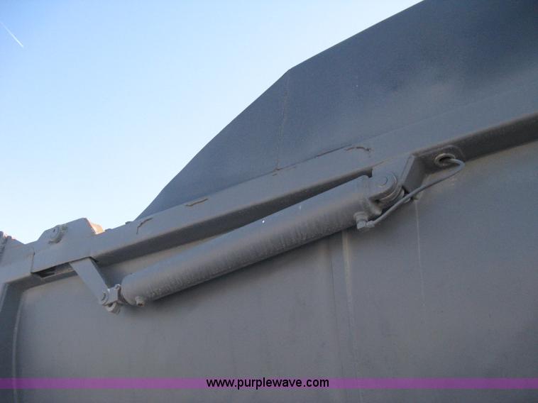 image for item I5626 1999 Stec barrel dump trailer