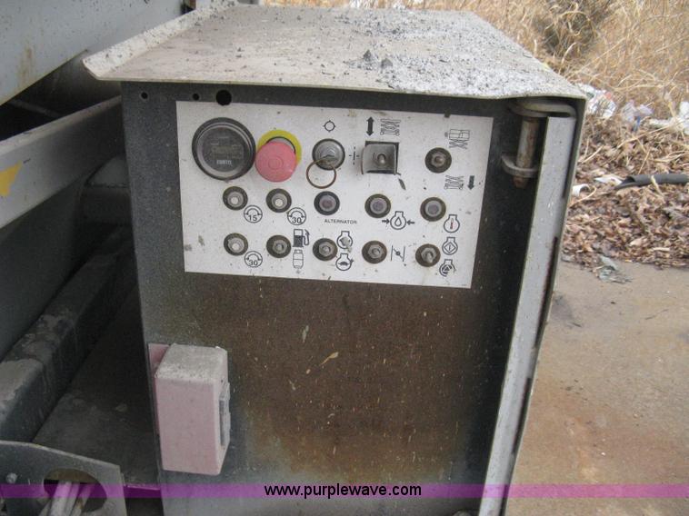 image for item I5637 1999 Mec 30724WD rough terrain scissor lift