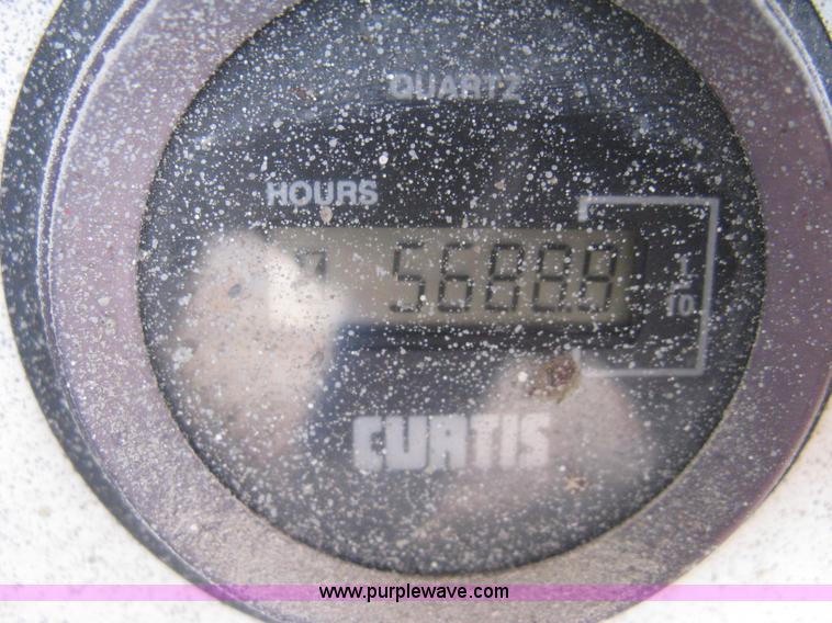 image for item I5637 1999 Mec 30724WD rough terrain scissor lift