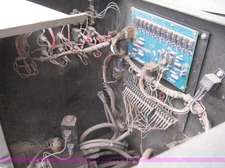 image for item I5637 1999 Mec 30724WD rough terrain scissor lift