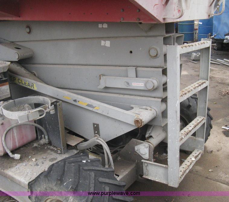 image for item I5637 1999 Mec 30724WD rough terrain scissor lift