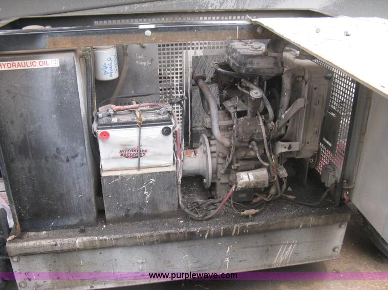 image for item I5637 1999 Mec 30724WD rough terrain scissor lift