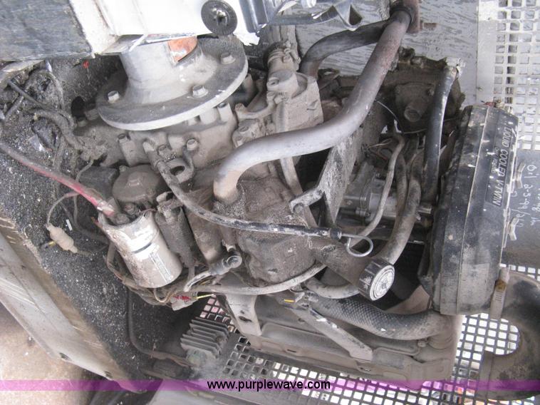 image for item I5637 1999 Mec 30724WD rough terrain scissor lift