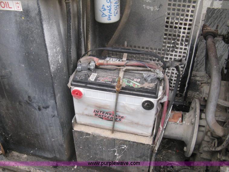 image for item I5637 1999 Mec 30724WD rough terrain scissor lift