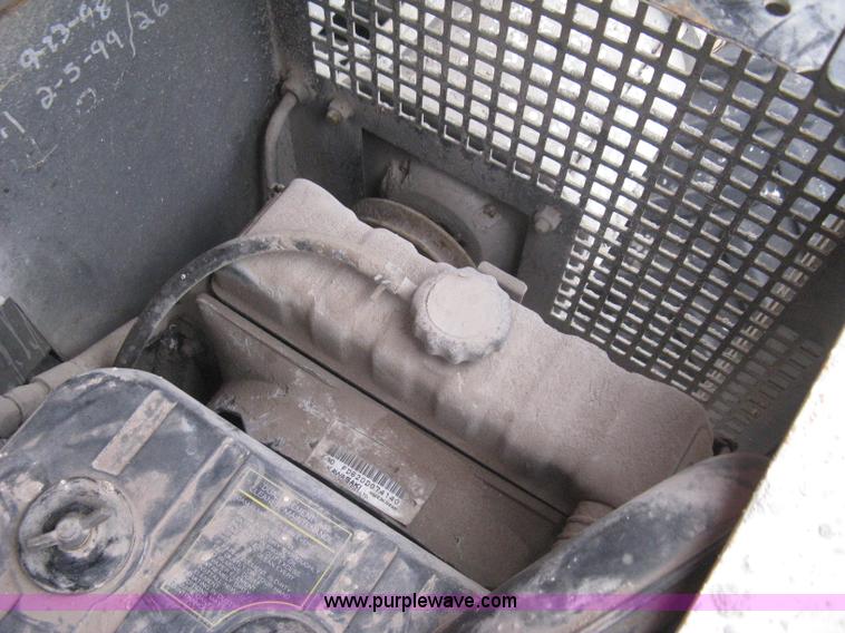 image for item I5637 1999 Mec 30724WD rough terrain scissor lift