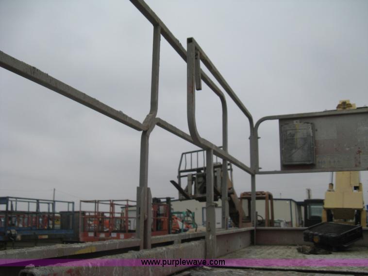 image for item I5637 1999 Mec 30724WD rough terrain scissor lift