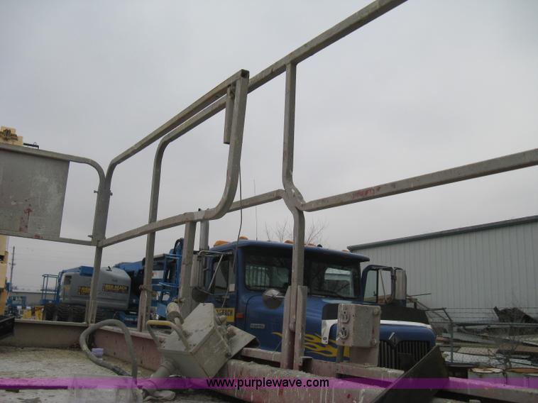 image for item I5637 1999 Mec 30724WD rough terrain scissor lift