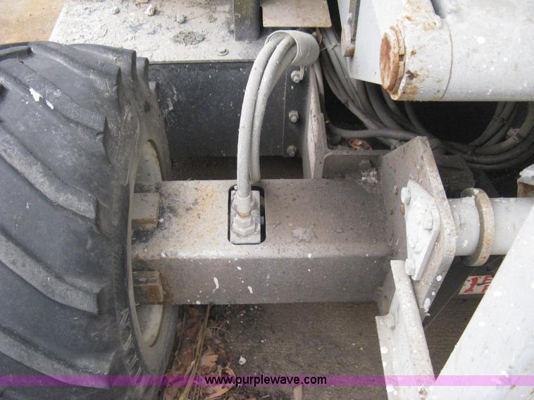 image for item I5637 1999 Mec 30724WD rough terrain scissor lift