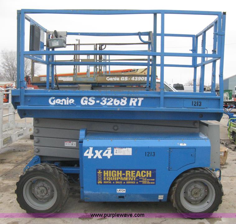 image for item I5638 2002 Genie GS3268RT scissor lift