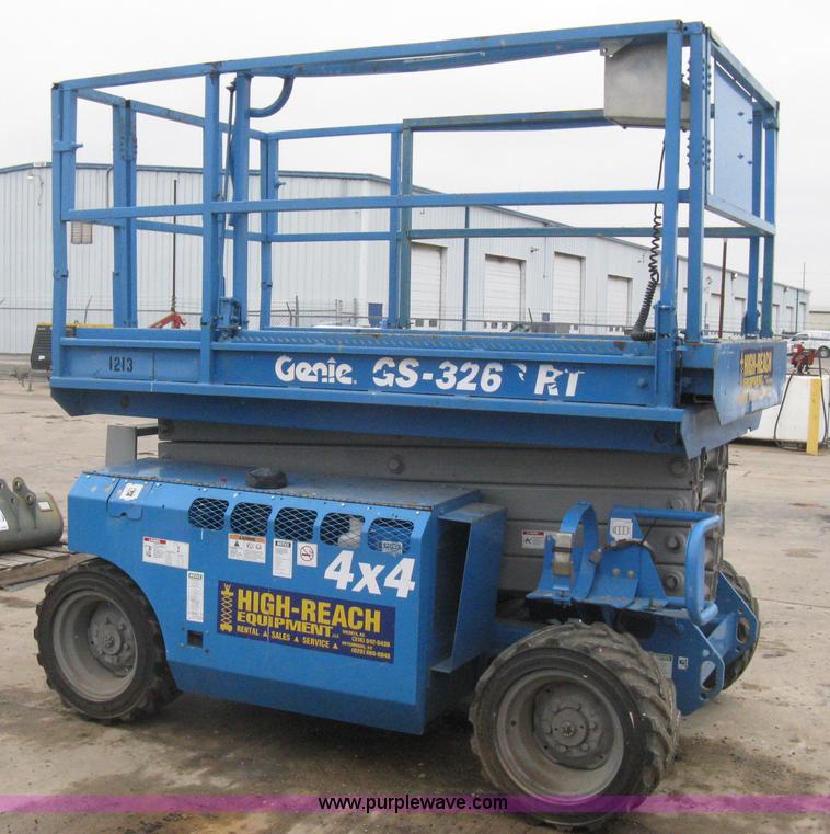 image for item I5638 2002 Genie GS3268RT scissor lift